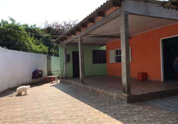 Casa a venda no bairro cavalhada, em frente a cecopam, terreno com 15m de frente por 30m de fundos. ótimo terreno para explorar ponto comercial, ou para construção. não aceita financiamento, avalia im