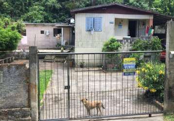 Casa de 3 dormitórios, 2 banheiro, cozinha, poço artesiano com agua, sala, área com lavanderia.&lt;br&gt;               segunda casa no mesmo terreno com 1 dormitório, cozinha americana, 1 banheiro, s