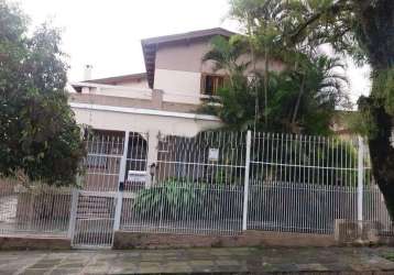 Casa de  3 dormitórios a venda no bairro sarandí (porto alegre). possui 296,11m² privativos, living para 3 ambientes, 1 suíte com 40m², cozinha ampla, lavanderia, despensa, peça ampla nos fundos, 4 ba