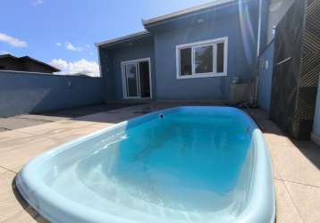 Casa nova com piscina para venda no bairro itapoá,  localizado no centro de itapoá / sc.