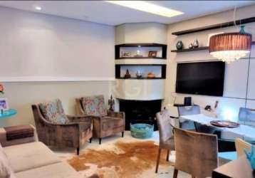 Lindo apartamento com 124 m² de área privativa e todo reformado.2&lt;br&gt;possui amplo living para 02 ambientes com lareira, churrasqueira, chapelaria, e lavabo. &lt;br&gt;são 03 dormitórios, sendo 0