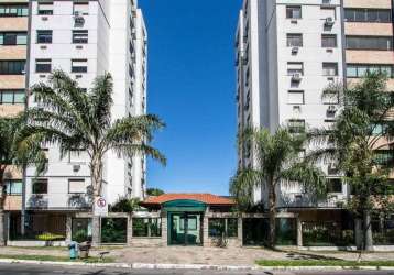 Apartamento para venda no bairro tristeza, com aproximadamente 64m², piso porcelanato, 02 dormitórios sendo 1 suíte, living 02 ambientes, cozinha americana com pia e armários sob medida e churrasqueir