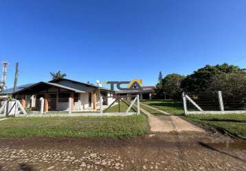 Casa na praia paraíso em torres com dois lotes