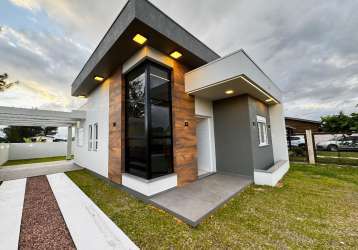 Casa localizada no balneário atlântico, arroio do sal/rs, residência de alto padrão, com 98 m² de área construída.