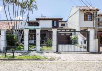 Ótima oportunidade no bairro ipanema: casa dois pavimentos, 4 dormitórios, 1 suíte, 2 hidromassagens, 1 closet, 4 banho social,  1 ambiente living, um sótão, mesanino, 2 lareiras, água quente, lavande