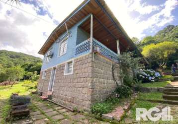 Sítio para venda em porto alegre/rs. lindo sítio com casa de campo, possui 2 dormitórios sendo 1 suíte com banheira , 2 banheiros, ampla sala de estar, cozinha americana, lareira, porão grande na casa