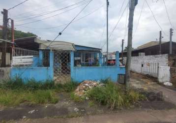 Vendo terreno com duas casas construídas, frente e fundo. ambas com 2 quartos 2 banheiros. garagem 2 veículos. terreno 10 frente 30 fundo.