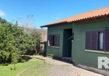 Ótima casa à venda na zona sul de poa/rs | o imóvel conta com 3 dormitórios sendo 1 suite, sala ampla de estar e jantar, cozinha ampla com bancada e fogão, escritório que pode ser quarto), banheiro e 