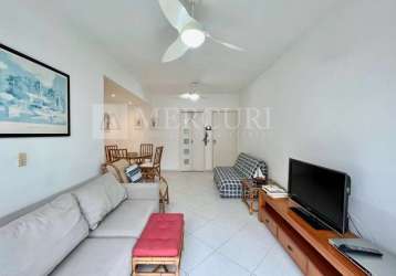 Apartamento espaçoso com 2 quartos (2 suítes) à venda, 80 m² por r$ 400.000 – prédio com lazer - enseada - guarujá/sp – imobiliária mercuri