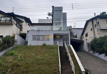 Casa de luxo em condomínio fechado com 3 suítes em arujá - condomínio hills iii por r$ 1.590.000