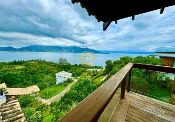 Casa nova mobiliada e decorada com vista extraordinária em condomínio - ilhabela sp