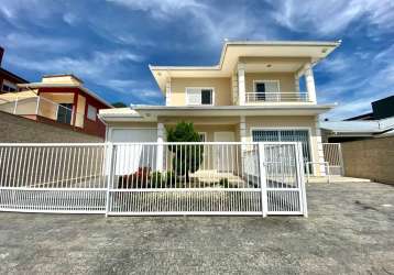 Casa com 4 quartos à venda na rua arcanjo cândido da silva, 3856, praia de fora, palhoça por r$ 1.350.000