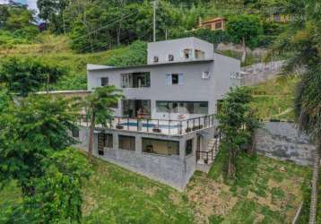 Casa com 5 dormitórios à venda, 602 m² por r$ 3.800.000,00 - itaipava - petrópolis/rj