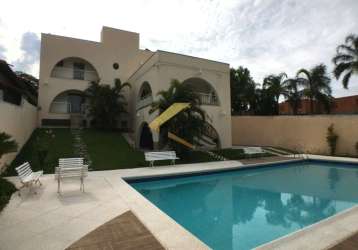 Casa à venda no parque taquaral - campinas, com 4 suítes, piscina, churrasqueira e garagem para 10 carros.