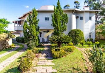 Casa em condomínio à venda em sousas, com 6 suítes (2 térreas), espaço gourmet e garagem para 10 carros.