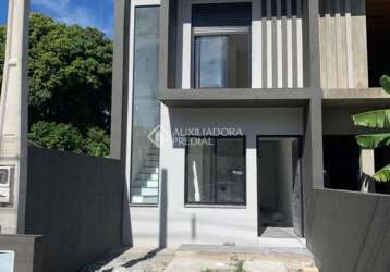 Casa com 2 quartos à venda na rua querência, 513, dona mercedes, gravataí, 70 m2 por r$ 294.000