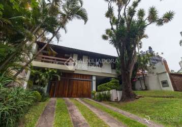 Casa em condomínio fechado com 4 quartos à venda na rua carlos trein filho, 1255, auxiliadora, porto alegre, 440 m2 por r$ 3.990.000