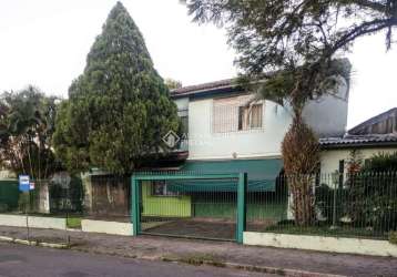 Casa em condomínio fechado com 5 quartos à venda na rua baden powell, 315, sarandi, porto alegre, 231 m2 por r$ 1.060.000