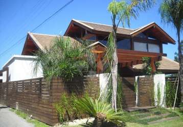 Casa em condomínio fechado com 4 quartos para alugar na das bromelias, 2, capão, garopaba por r$ 6.000