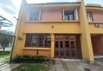 Casa em condomínio fechado com 4 quartos à venda na rua general gomes carneiro, 80, medianeira, porto alegre por r$ 477.000