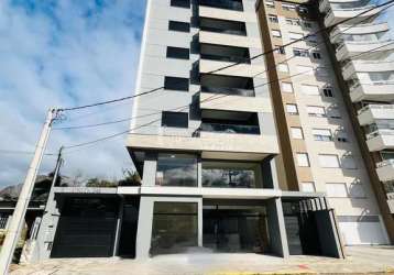 Apartamento no centro com 2 dormitórios (uma suíte)