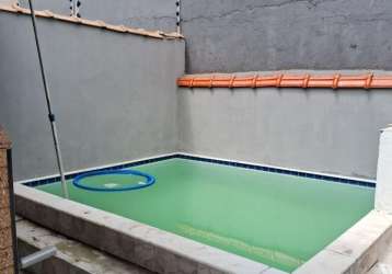 Linda casa lado praia com piscina e churrasqueira