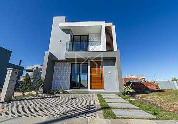 Casa em condomínio fechado com 3 quartos à venda na avenida centenário, 1011, passo das pedras, gravataí, 127 m2 por r$ 769.000