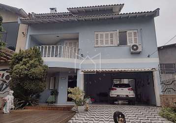 Casa com 5 quartos à venda na rua vinte de setembro, barnabé, gravataí, 258 m2 por r$ 1.300.000