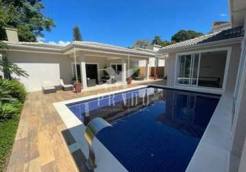 Casa térrea alto padrão no condomínio flamboyant com 5 suítes, piscina e 490m2 - atibaia/sp