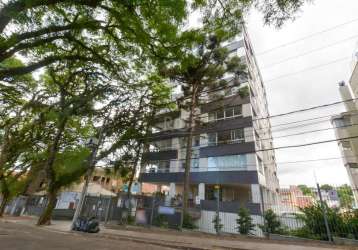 Ótimo apartamento , de fundos  com  2 dormitórios, 1 suíte, living 2 ambientes, banho social, cozinha americana com churrasqueira, área de serviço e uma vaga  coberta escriturada, com depósito. a infr