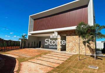 Casa com 4 dormitórios à venda, 318 m² por r$ 3.700.000,00 - condomínio golden village - jardim sul - uberlândia/mg