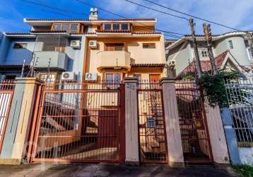 Casa com 3 quartos à venda na rua dona adda mascarenhas de moraes, 792, jardim itu sabará, porto alegre, 239 m2 por r$ 840.000