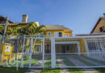 Casa com 3 quartos à venda na rua josué guimarães, 115, espírito santo, porto alegre, 208 m2 por r$ 960.000