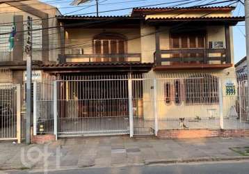 Casa com 3 quartos à venda na avenida rio são gonçalo, 305, santa maria goretti, porto alegre, 280 m2 por r$ 900.000