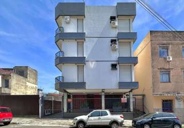 Apartamento térreo 3 dormitórios + dependência no centro de santa maria.