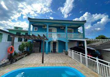 Casa com piscina na salgado filho