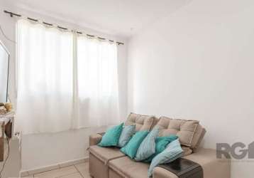 Apartamento no bairro sarandi, no condomínio residencial porto mediterrâneo, com 2 dormitórios sendo 1 suíte, banheiro social, living para dois ambientes, cozinha com área de serviço integrada. fica 1