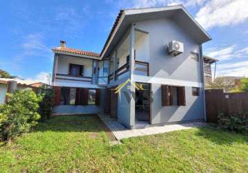 Casa com 4 dormitórios sendo 3 suítes à venda, por r$ 660.000 - centro - tramandaí/rs