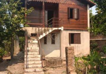 Casa de 4 dormitórios, sala  ampla, cozinha , banheiro social, patio amplo de 805,20m2, composto por arvores de sombra alem de variedade de flores.&lt;br&gt;imóvel bem localizado próximo a todas comod