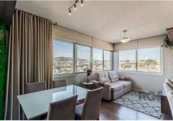 Belíssimo apartamento com 64m privativos, 2 dormitórios sendo 1 suíte, em andar alto com vista panorâmica no bairro partenon. cozinha estilo americana, amplo living para dois ambientes, banheiro socia