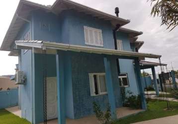 Bela casa  em sapiranga  . casa ampla com quatro dormitórios sendo uma suite  com banheira de hidromassagem cozinha ampla estilo americana integradas com sala de jantar e   estar , rebaixo em gesso , 