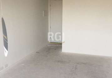 Conjunto comercial novo,frente, com posibilidade de unir 2 salas, com 24,00m², lavabo, garagem rotativa, elevador, auditório, sala de reuniões, infraestrutura completa e 23 lojas no térreo.