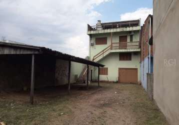 Casa 3 dormitórios em amplo terreno em cachoeirinha&lt;br&gt;espaçosa casa dividida em 3 pavimentos com um total de 350m2. térreo com garagem ampla, banheiro, pé direito de 5 metros e mezanino com 3 a