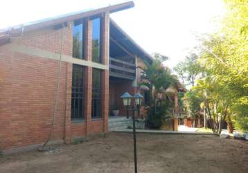 Casa á venda no bairro tarumã em viamão.&lt;br&gt;imóvel com ampla com sala de estar, jantar, cozinha, quatro dormitórios, sendo um suíte com hidro e closet, três banheiros, mezanino com amplo espaço,