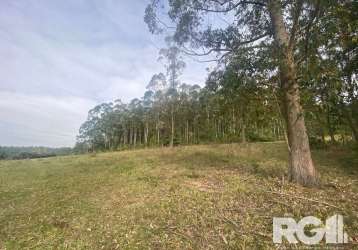 Chácara á venda em viamão/rs. imóvel constituído de 14 hectares, conta com açude, árvores nativas e muito arborizado. o local é tranquilo e aconchegante com muita calmaria e bastante natureza. agende 