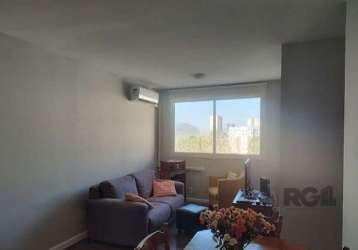 Apartamento com 68 m² no bairro jardim carvalho em porto alegre - rs 3 dormitórios sendo 1 suite, living para 2 ambientes com vista maravilhosa, cozinha americana e área de serviço, banheiro social, c