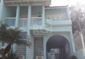 Casa com 3 quartos à venda na rua manauê, --, vila assunção, porto alegre, 217 m2 por r$ 1.100.000