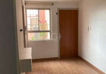 Vende-se apartamento térreo desocupado, semi mobiliado, 2 dormitórios, living amplo em 2 ambientes, copa e cozinha, área de serviço e 1 vaga de garagem. prédio com salão de festas, zeladoria, churrasq