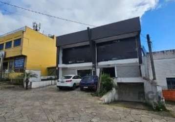 Libertas imobiliária aluga loja com 450m² de área privativa, localizado no bairro vila jardim. imóvel com recepção, amplo salão, mezanino, pé direito amplo, cortinas de ferro, fachada com vidro e 2 ba