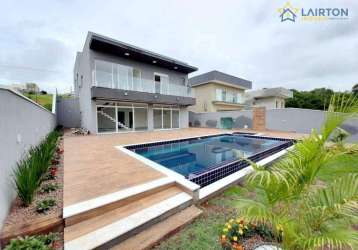 Deslumbrante casa de 4 suítes à venda por r$ 1.799.000 com piscina borda infinita e vista para área verde – terra preta, mairiporã/sp